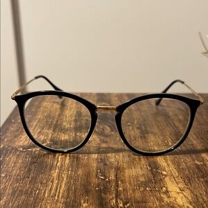 Ray Ban Black and Gold Round Glasses RB7140